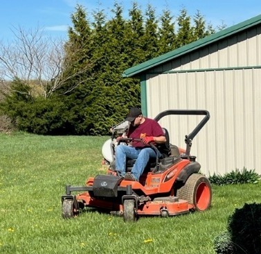 United Way team lawn mower