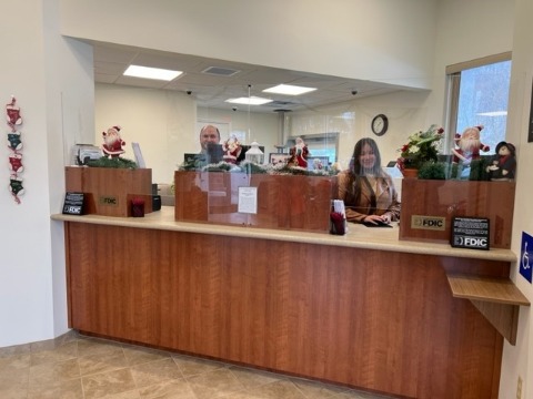 people behind saxton front desk