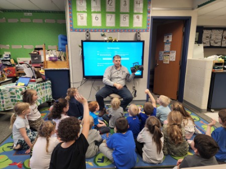 doug reading ag book